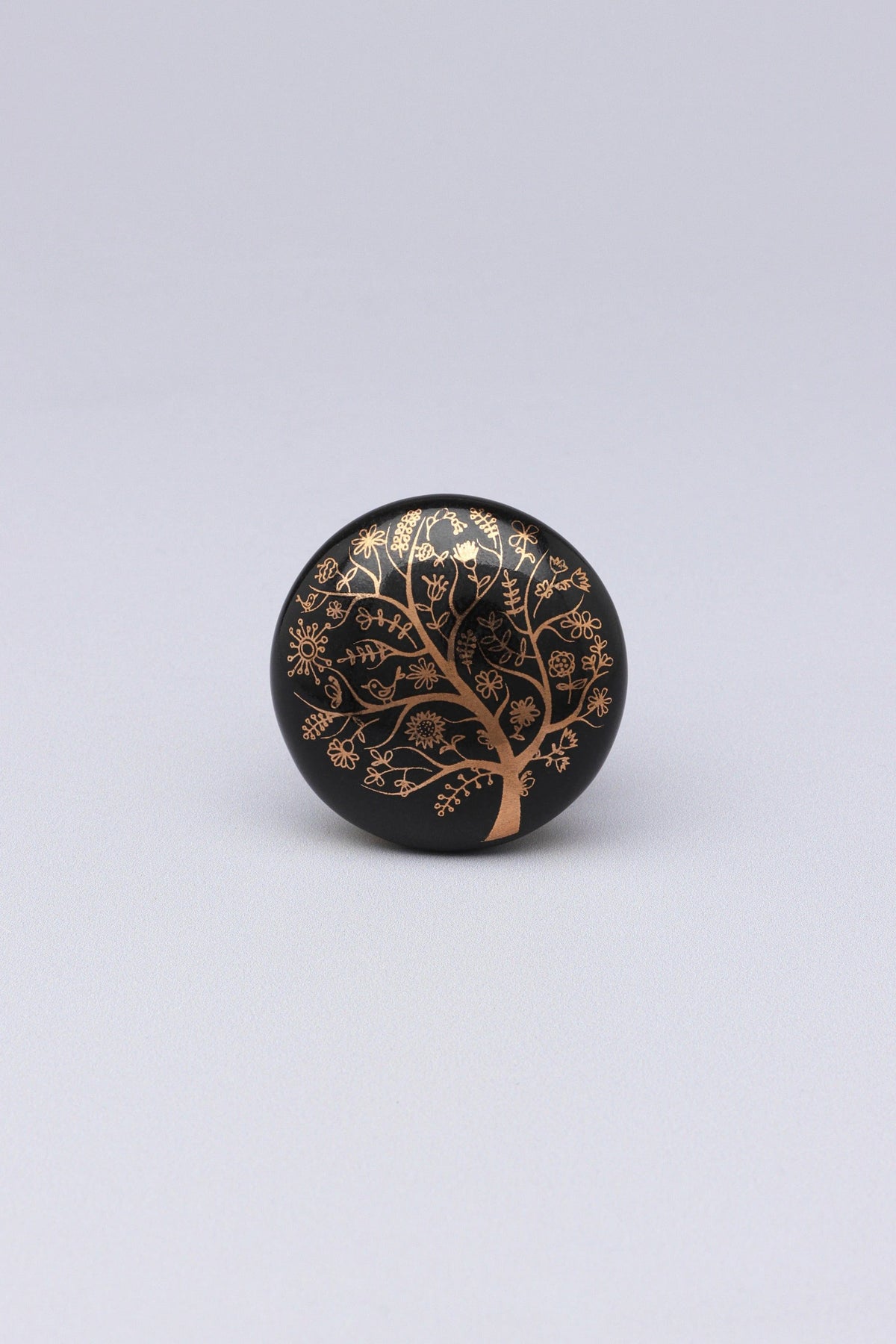 Eternal Bloom Tree of Life Ceramic Cabinet Knob in Black and Gold — close-up view, G Decor
