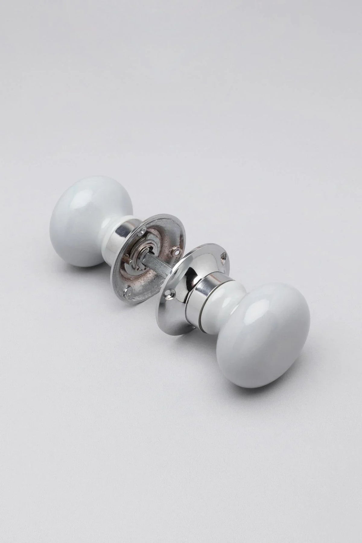 Perfect Edit Light Grey Ceramic Mortice Door Knobs with Chrome Base — lifestyle view, G Decor