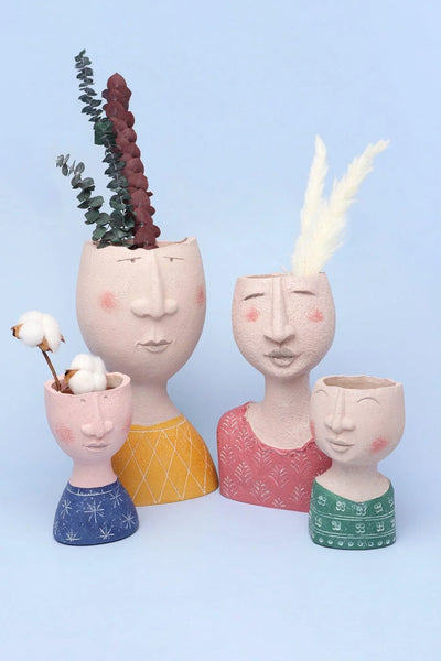 Familia Sculpted Face Ceramic Planter and Vase Collection